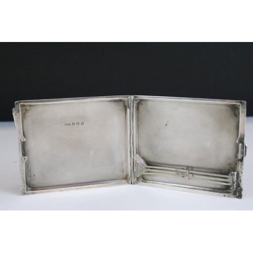 639 - 1930's Silver cigarette case of curved rectangular form, with engine turned decoration, Chester 1935... 