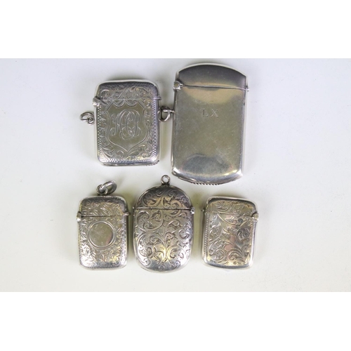 642 - Group of five silver hallmarked vesta cases, featuring a 1920's vesta case of plain polish slim rect... 