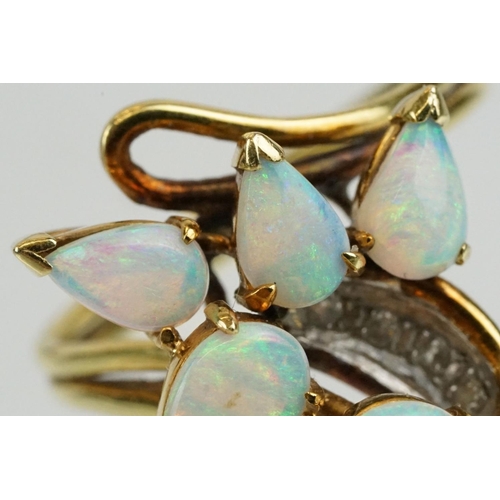 280 - 18ct gold and opal ring set with five tear drop shaped opal cabochons with diamond accent stones. Ma... 