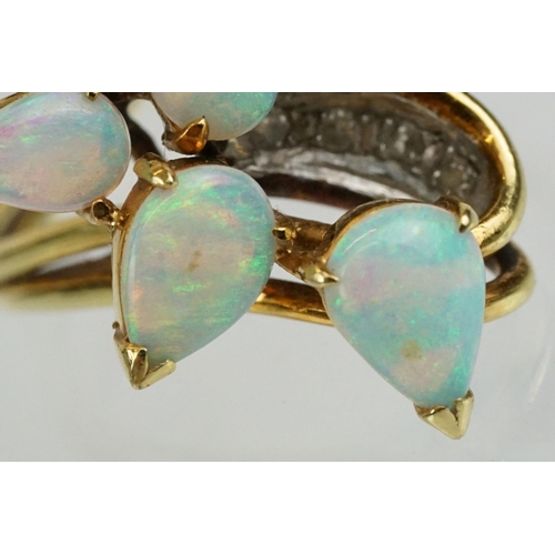 280 - 18ct gold and opal ring set with five tear drop shaped opal cabochons with diamond accent stones. Ma... 