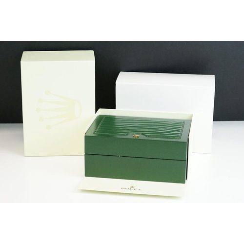 544 - Rolex - A collection of five green empty Rolex watch boxes each having wave design panel to top with... 