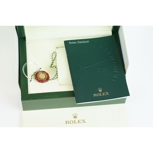 544 - Rolex - A collection of five green empty Rolex watch boxes each having wave design panel to top with... 