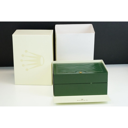 544 - Rolex - A collection of five green empty Rolex watch boxes each having wave design panel to top with... 