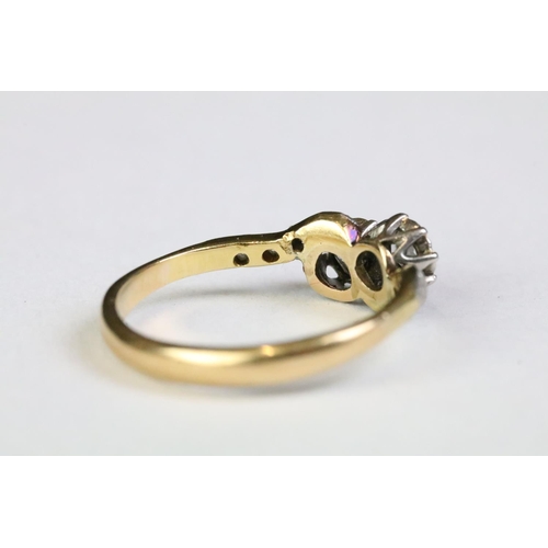 330A - 18ct gold and diamond moi et toi ring. The ring being set with two old cut diamonds with further dia... 