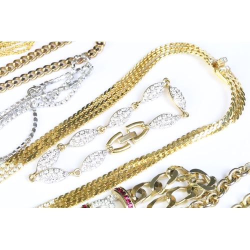 340 - Collection of ladies costume jewellery to include a flat curb link necklace chain set with red and w... 