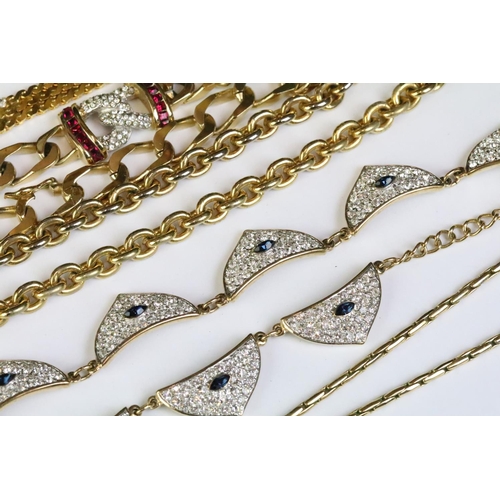 340 - Collection of ladies costume jewellery to include a flat curb link necklace chain set with red and w... 