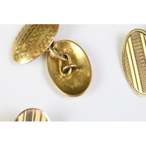 360A - Three pairs of gold cufflinks to include a pair of 18ct gold domed head engine turned cufflinks (hal... 