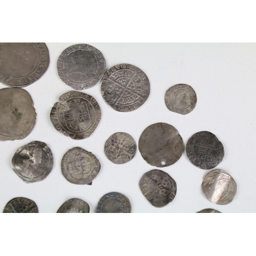 101A - A collection of British hammered silver coins to include Queen Elizabeth I examples, long cross penn... 