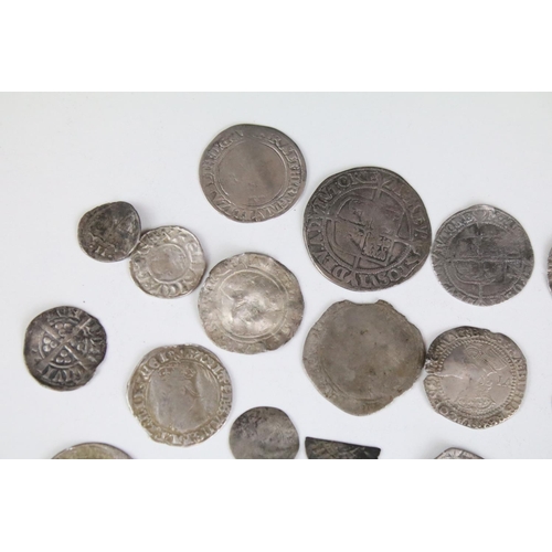 101A - A collection of British hammered silver coins to include Queen Elizabeth I examples, long cross penn... 