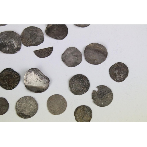 101A - A collection of British hammered silver coins to include Queen Elizabeth I examples, long cross penn... 