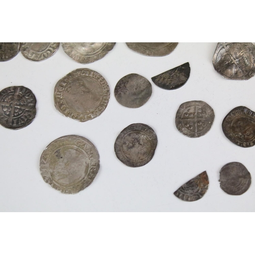 101A - A collection of British hammered silver coins to include Queen Elizabeth I examples, long cross penn... 