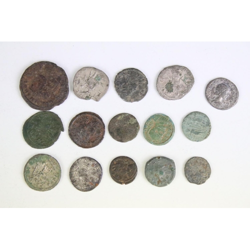 301 - A collection of early Roman coins to include Bronze and Silver examples