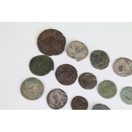 301 - A collection of early Roman coins to include Bronze and Silver examples