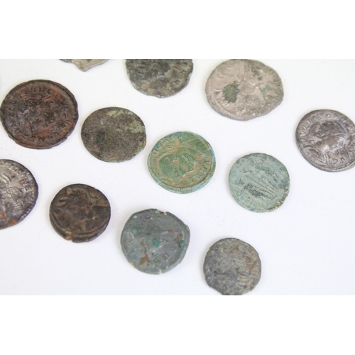 301 - A collection of early Roman coins to include Bronze and Silver examples