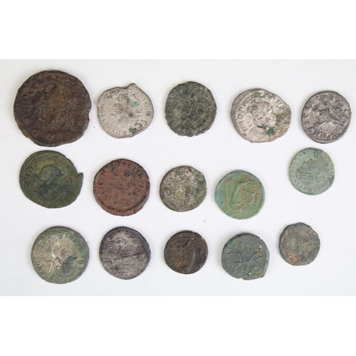 301 - A collection of early Roman coins to include Bronze and Silver examples