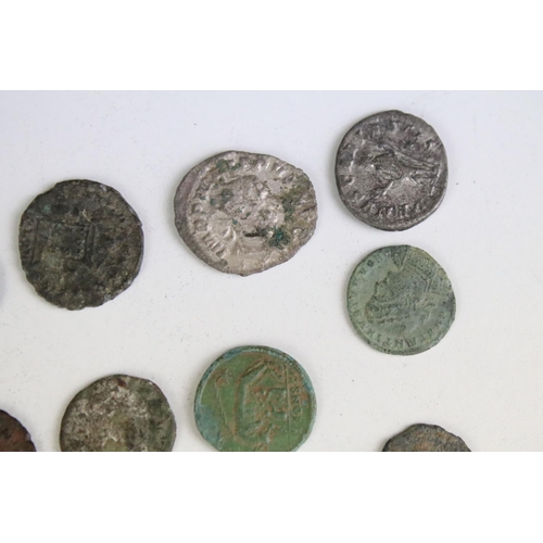 301 - A collection of early Roman coins to include Bronze and Silver examples