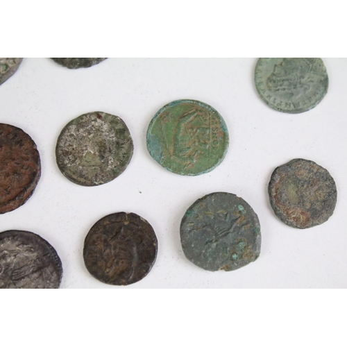 301 - A collection of early Roman coins to include Bronze and Silver examples