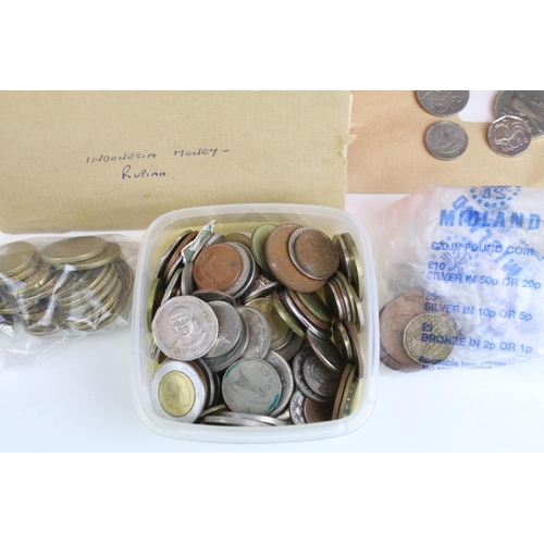 306 - A collection of British and World coins to include pre decimal examples together with a selection of... 