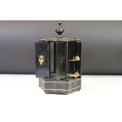 142 - 19th Century Victorian cigar dispenser constructed from ebonised wood of hexagonal form with six pan... 