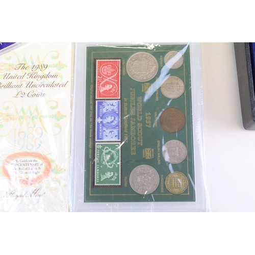 245 - A large collection of British Royal mint uncirculated coin sets to include £1, 50p and £2 examples t... 