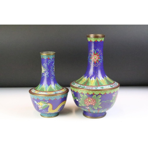 131 - Two Chinese cloisonne vases of baluster form, with floral & foliate design on a cobalt blue ground. ... 