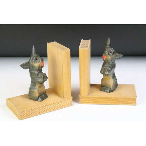 132 - Pair of Wooden Bookends in the form of Books and Carved Dogs, 13.5cm high