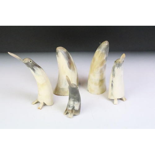 136 - Group of five horn ornaments to include three carved in the form of penguins. Tallest approx 17.5cm