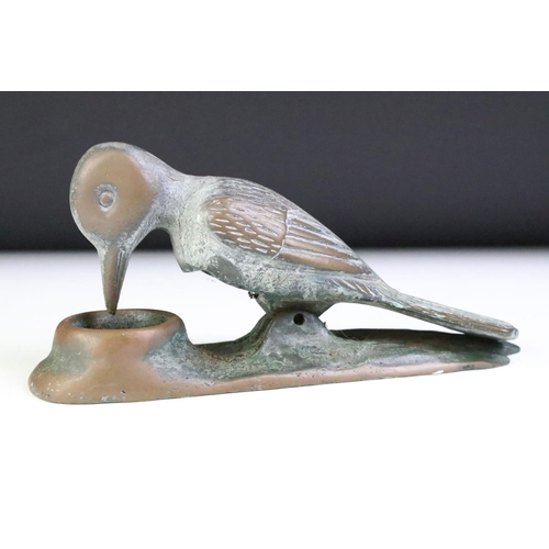 137 - Bronze door knocker in the form of a woodpecker, approx 20cm long