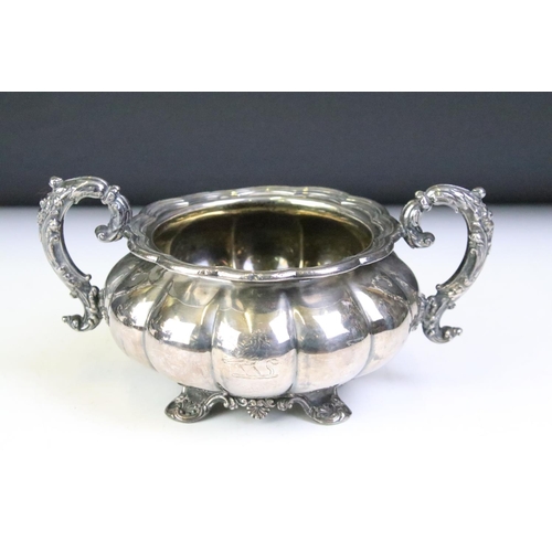 186 - A small group of mixed silver plate to include a large twin handled sugar bowl, cream jug and a salt... 