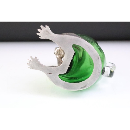 188 - Unusual silver plated squirrel decanter in green glass