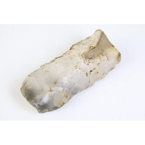 197 - A collection of three Neolithic flint tools together with a stone age example.