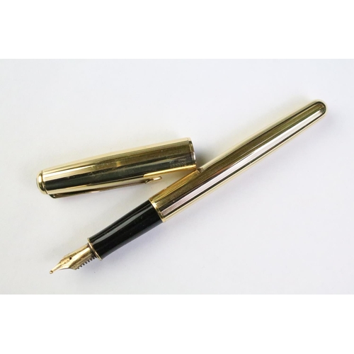 202 - A cased Waterman fountain pen with 18ct gold nib together with three other examples to include Parke... 