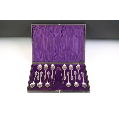 204 - A cased set of scottish hallmarked sterling silver spoons together with a cased set of silver plated... 