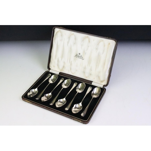 204 - A cased set of scottish hallmarked sterling silver spoons together with a cased set of silver plated... 