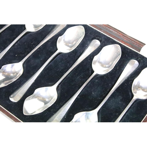 204 - A cased set of scottish hallmarked sterling silver spoons together with a cased set of silver plated... 