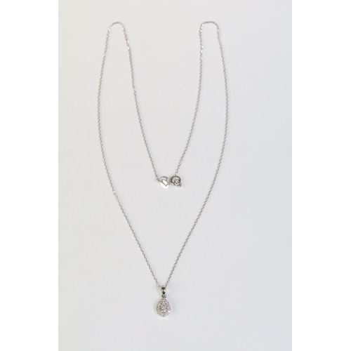 211 - 18ct white gold pear shaped diamond necklace on gold chain