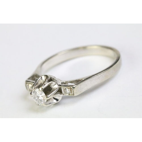 219 - White gold three stone diamond ring