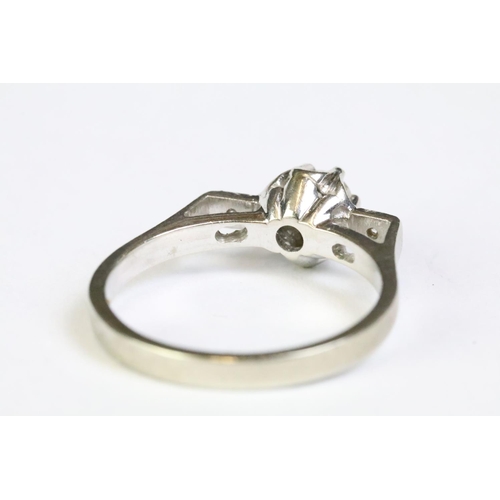 219 - White gold three stone diamond ring