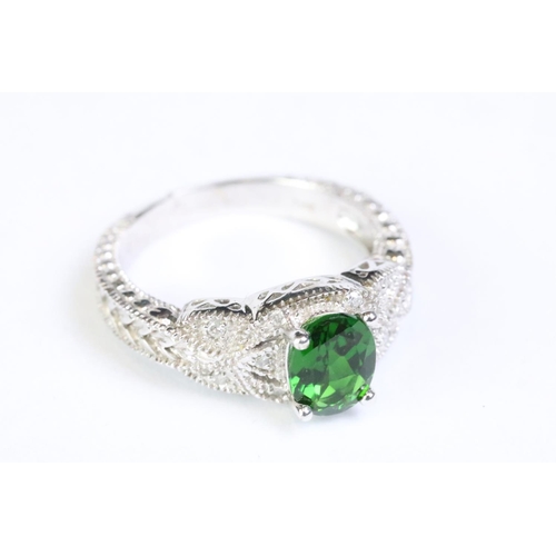 221 - 10ct white gold, tourmaline and diamond ring