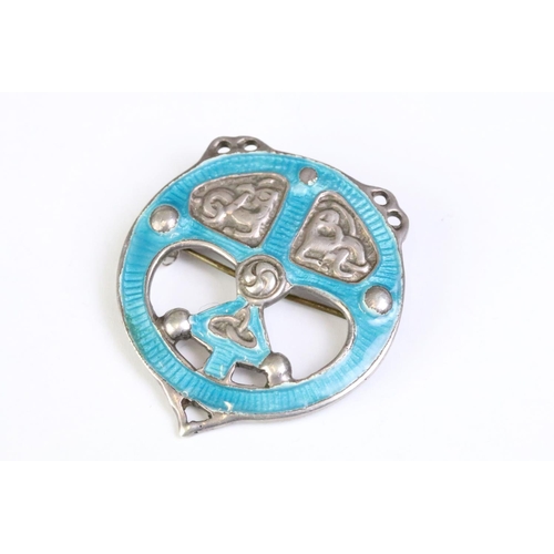 223 - A fully hallmarked sterling silver and turquoise enamel Alexander Ritchie Iona brooch, of circular C... 