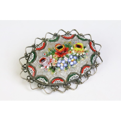 227 - A collection of four micro mosaic brooches to include two in the form of musical instruments