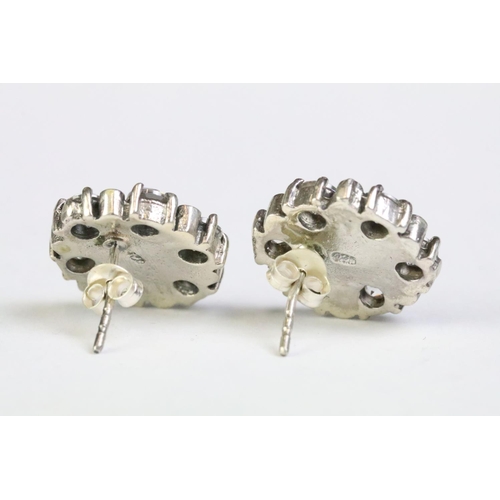 233 - Pair of silver and CZ stud earrings