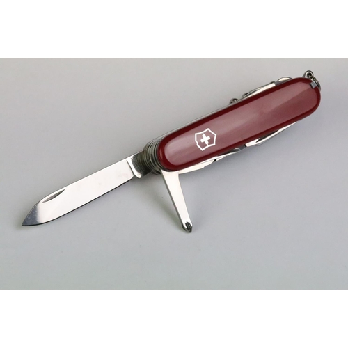 237 - A genuine Victorinox Swiss army knife with a good selection of blades and tools, complete with Victo... 