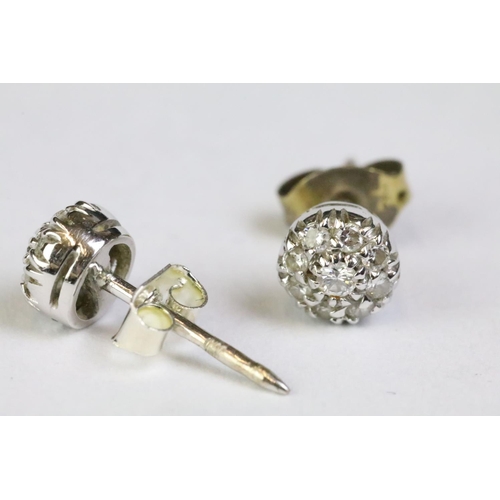 244 - Pair of 14ct white gold diamond stud earrings