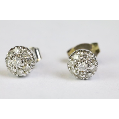 244 - Pair of 14ct white gold diamond stud earrings