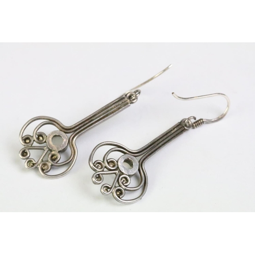 246 - A pair of ladies 925 sterling silver drop earrings, in the art nouveau style each set with central c... 