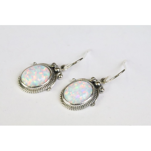 253 - Pair of silver and opal drop earrings