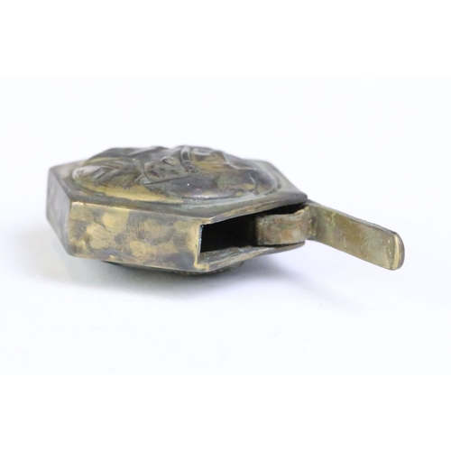 265 - Brass cased vesta with embossed decoration