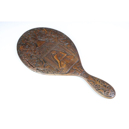 274 - Group of collectables to include a carved Buddhist wooden hand mirror (approx 38cm long), faux torto... 