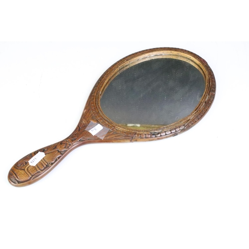 274 - Group of collectables to include a carved Buddhist wooden hand mirror (approx 38cm long), faux torto... 